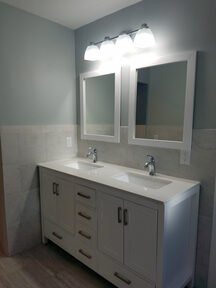 Double sink vanity with new mirrors and lighting!