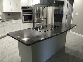 Beautiful kitchen island with cook top stove!